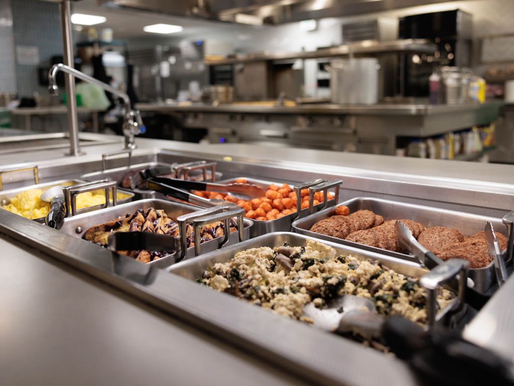 A dining hall food service counter
