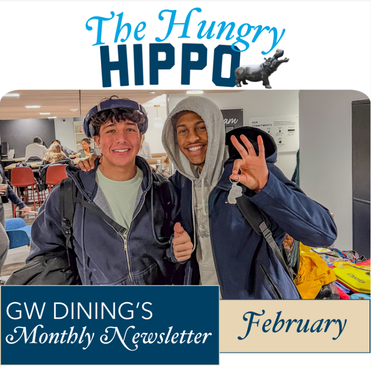 The Hungry Hippo: GW Dining's Monthly Newsletter for February, photo shows two students smiling at Thurston Dining Hall