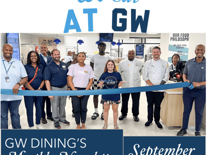 We Eat At GW: GW Dining's Monthly Newsletter for September, photo portrays Dining Leadership Team along with students smiling at Pelham Commons ribbon cutting
