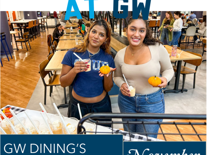 We Eat at GW: GW Dining's Monthly Newsletter for November, photo shows two students smiling with pumpkins