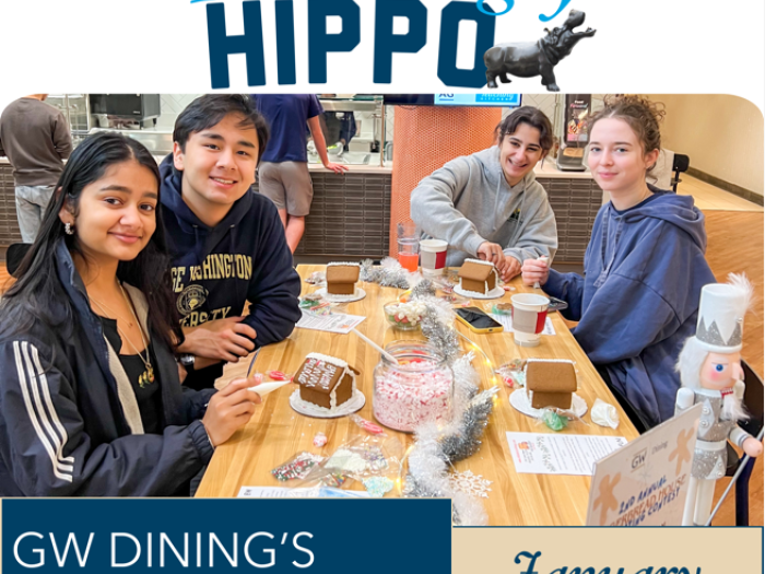 The Hungry Hippo: GW Dining's Monthly Newsletter for January, photo shows a group of students at the gingerbread house decorating event
