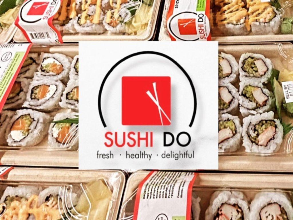 Sushi Do logo over a photograph of sushi rolls