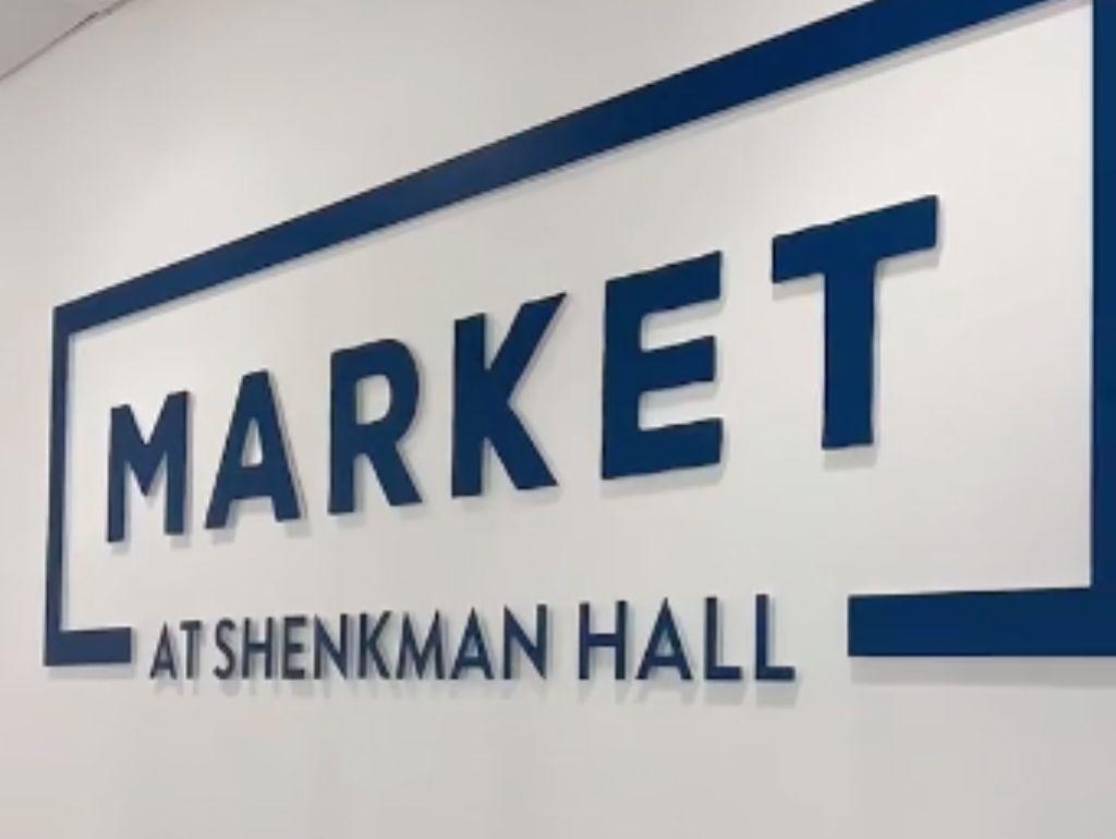 Sign for "Market" at Shenkman Hall